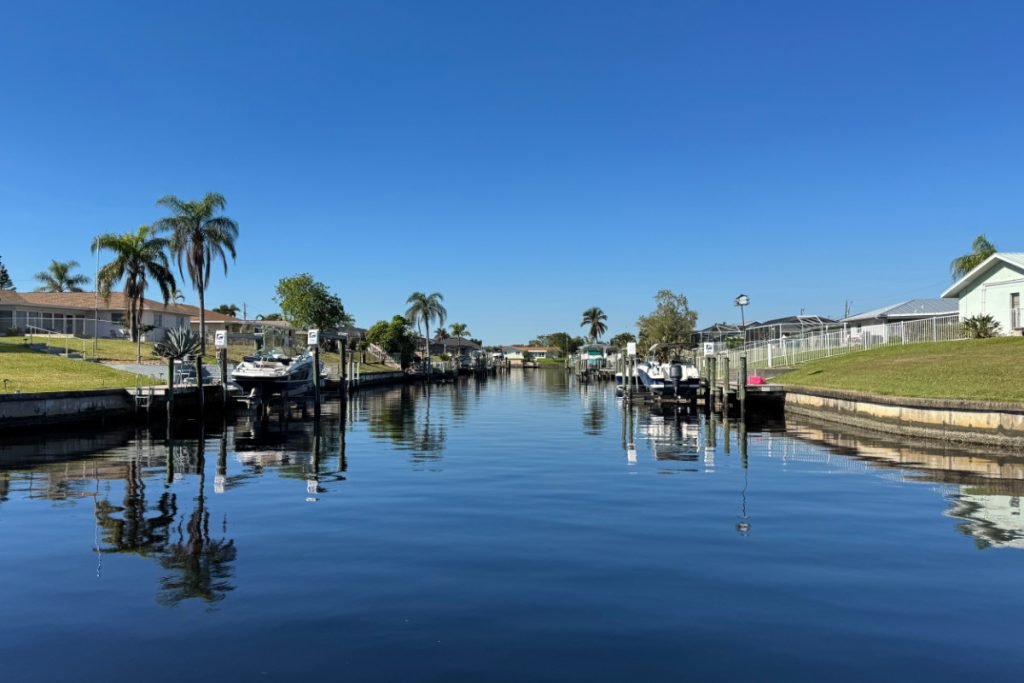 Canal between residential houses in Cape Coral