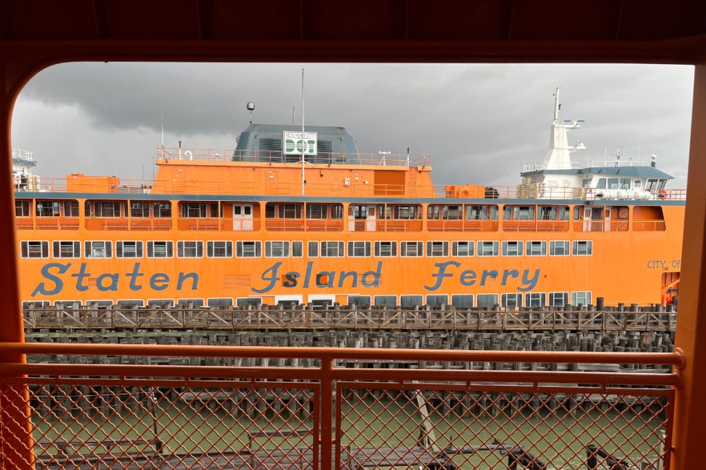 Photo of a Staten Island Ferry, taken from inside another Staten Island Ferry