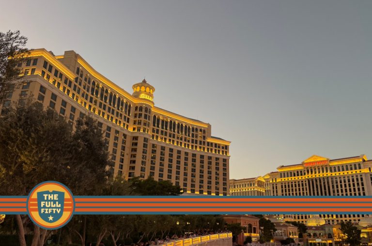 Evening photo of the Bellagio Hotel alongside Caesars Palace in Las Vegas